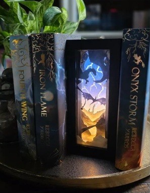 Illuminated Fourth Wing book nook with Tairn, Andarna, and Sgaeyl flying over Basgiath