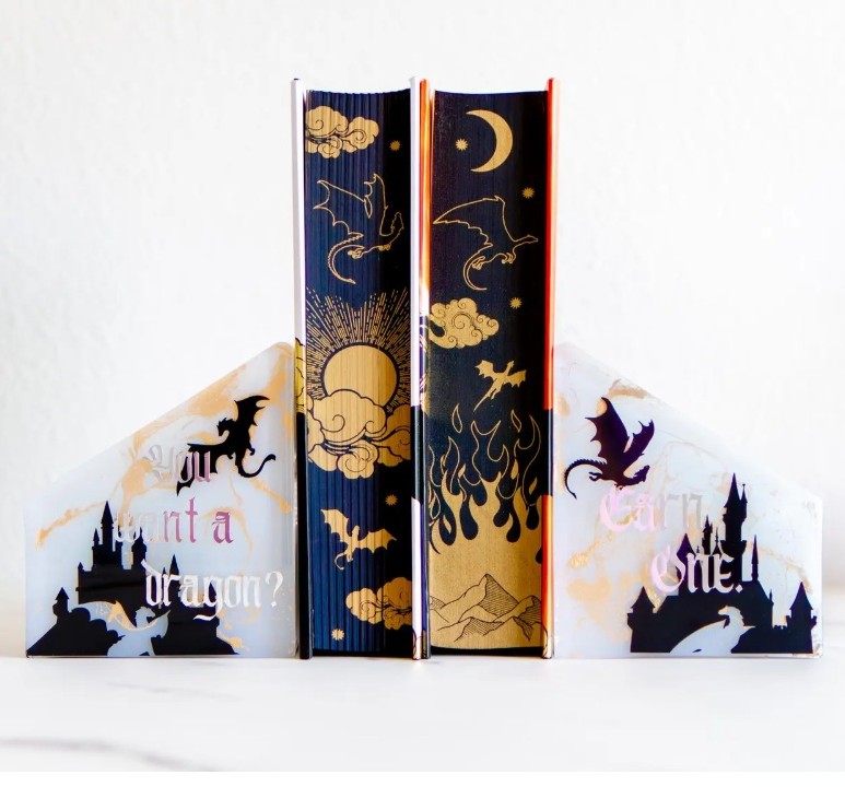 Fourth Wing dragon bookends with “You Want a Dragon?” and “Earn One!” lettering